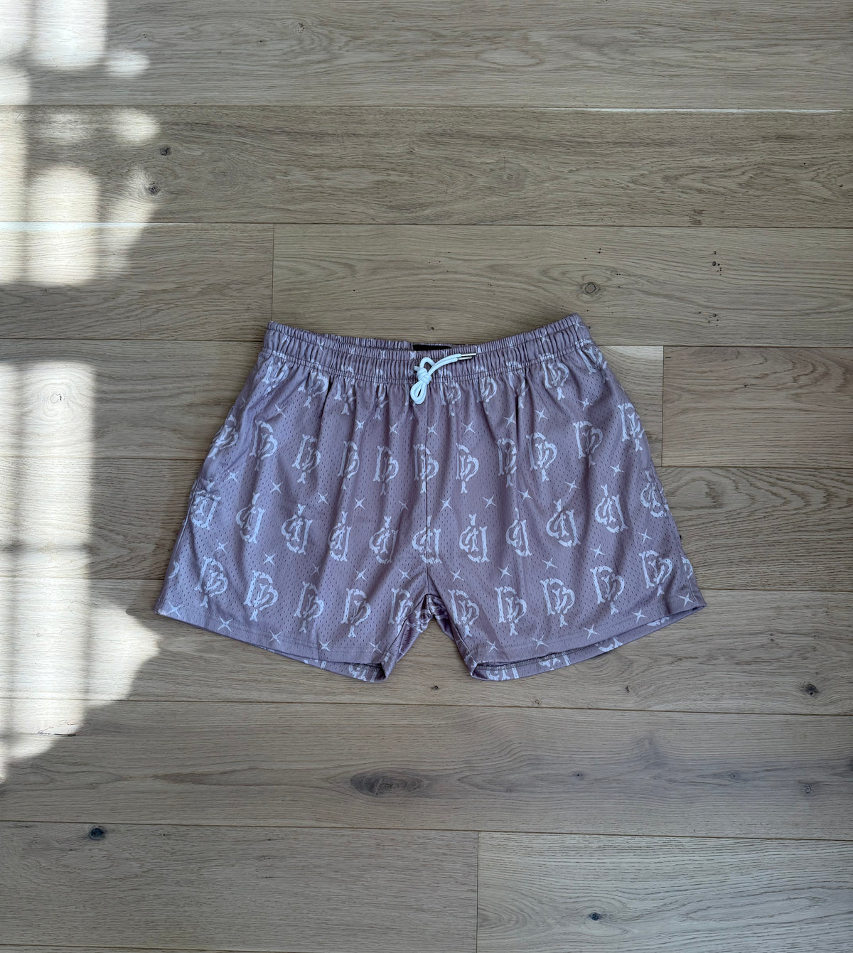 Bone marrow monogram shorts